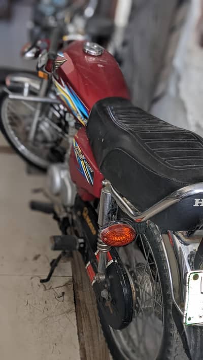 Honda 125 good condition my name