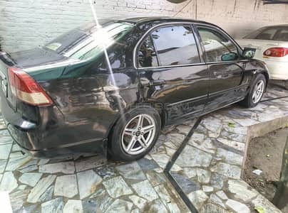 Honda civic vti oriel promatec 2004