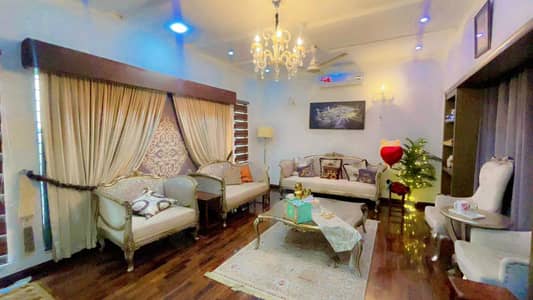 One Kanal Used Modern Design Double Unit Bungalow For Sale At Prime Location Of DHA Lahore Near To Park Masjid & Commercial Market.