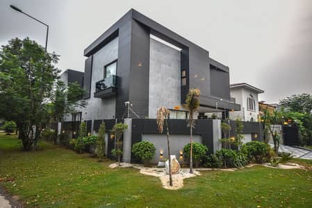 One Kanal Corner Brand New Luxury Ultra-Modern Design Most Beautiful Full Basement Fully Furnished Home Theater Lift Bungalow For Sale At Prime Location Of DHA Lahore Near To Park Masjid & Commercial Market.