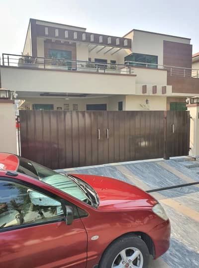 One Kanal Used Modern Design Double Unit Bungalow For Sale At Prime Location Of DHA Lahore Near To Park Masjid & Commercial Market.