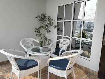 out door chairs with table and glass top