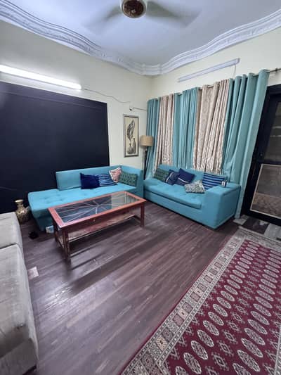 L shaped sofa + 2 big seats + center Table + curtains