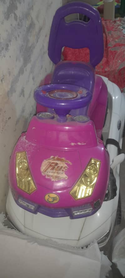 small car pink and purple colours