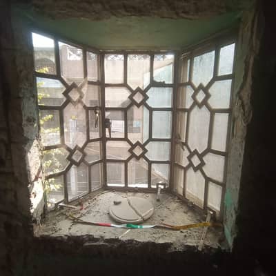 Iron window with glass for sale made from heavy material