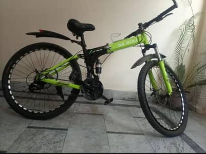 SKX-PRO Folding biike 26 inch with Shimano gear shifters.