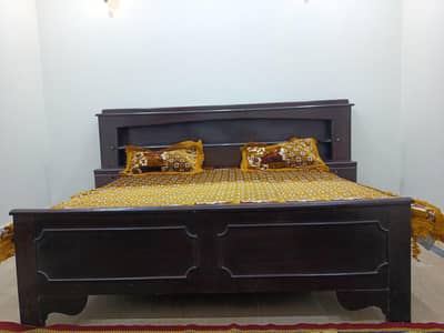 King size solid wood bed with attached side tables -heavy furniture -