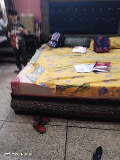 selling bed and side table