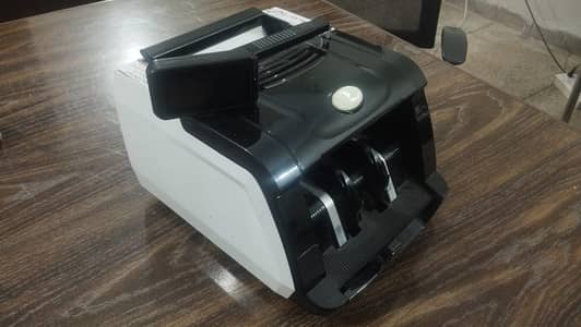 Cash currency note counting machine with fake note detection machine
