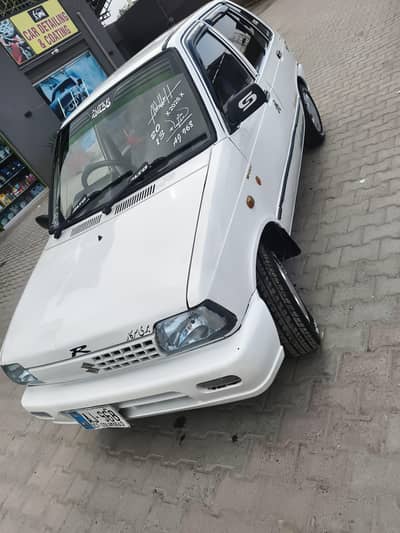 Mehran alto 2013 model 2 pic touching Islamabad number life time