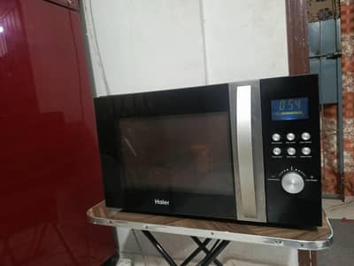 Haier 2 in 1 microwave + grill oven 32 liter neat and clean condition