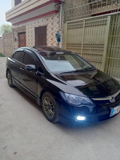 Honda civic vti oriel prosmatec 2009/10  Full option.