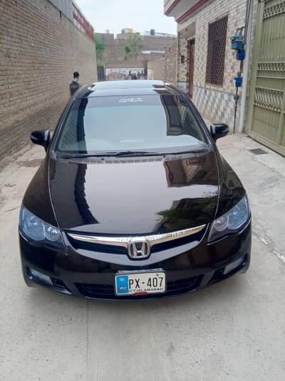 Honda civic vti oriel prosmatec 2009/10  Full option.