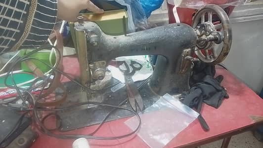 sewing machine with table stand urgent sell