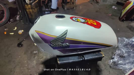 Honda 125 orjnal tenky tapa seet cundesin 10 by 8 All ok 2001 modal