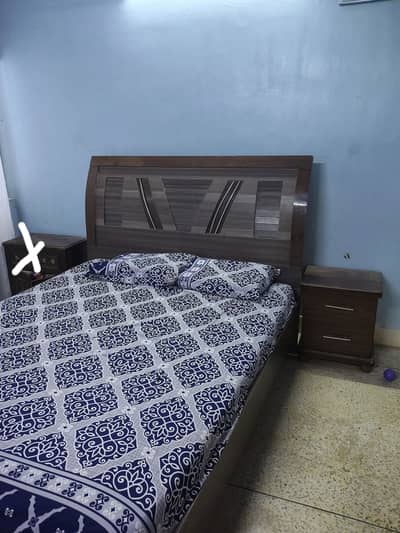 Queen size bed with mattress and 1 side table