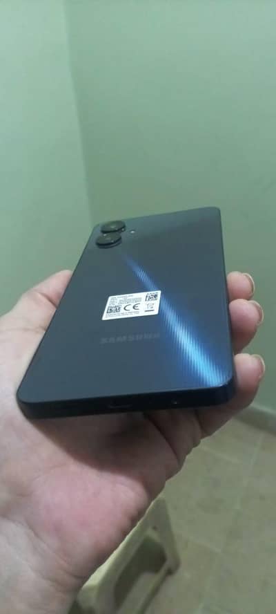 Samsung A06 . . .  with box. . .  21000 . . . 10/10