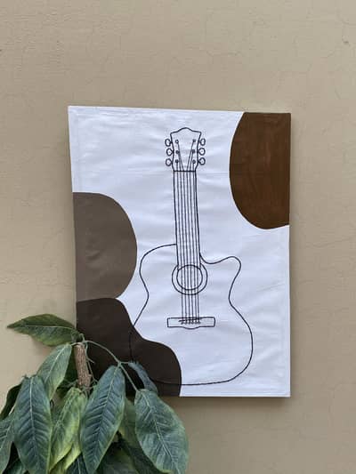 Hand-stitched minimalist guitar on canvas