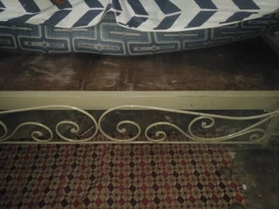 Iron bed with side tables