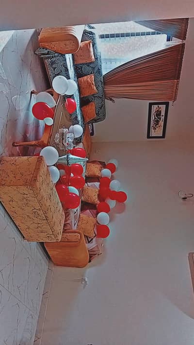 L shape sofa with puffy and center table