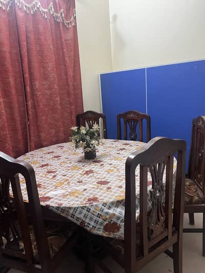 6 seater wooden dining table for sale