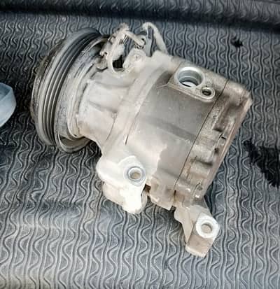 car ac compressor 1300cc Corolla gli.