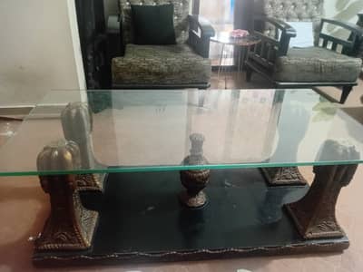 Glass and wooden table for drawing room
