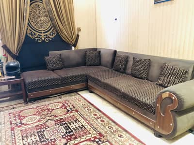 Brown colour used L shape sofaa in elegant look