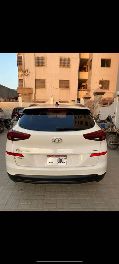 Hyundai Tucson AWD Model 2021 Reg. 2022 White  color