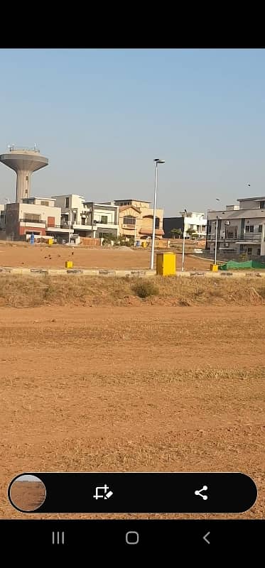 10 Marla plot with some extra land. big front sunfacing. i avenue main boulevard. Dem Rs 10.7 million only negotiable.