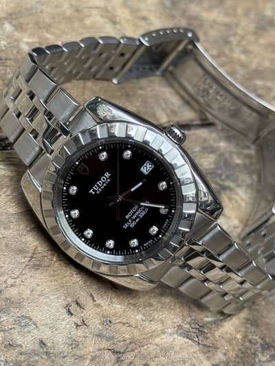 Tudor Classic Date Automatic Black diamond Dail.