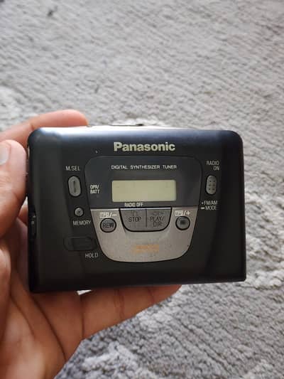 Panasonic tap Model: RQ-XV30.