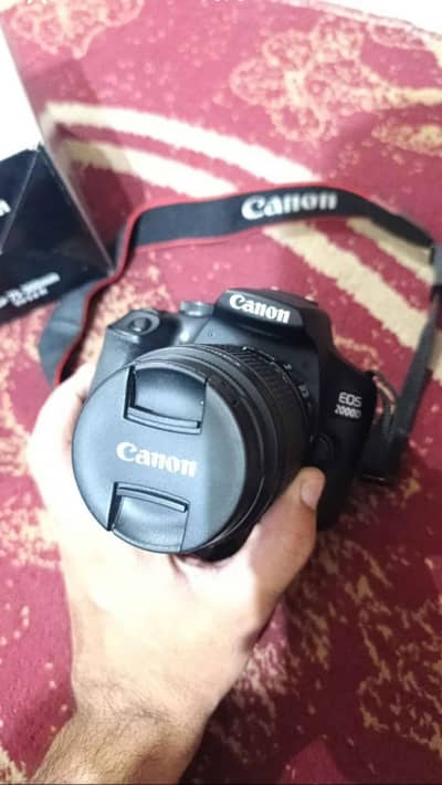 CANON EOS 2000D with 18-55mm lens and 70-300mm lens