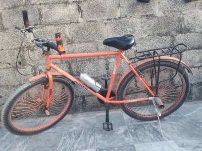 Bicycle - Orange - Good Condition with Accessories