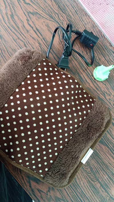 Electric hot water bag for pain relief