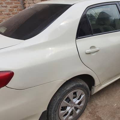 Toyota Corolla GLI 2011 model Roof pillars and Dicki are original