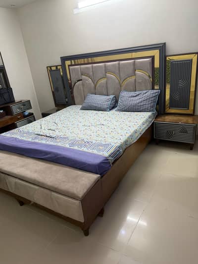 Bed with side tables dressing table and cupboard