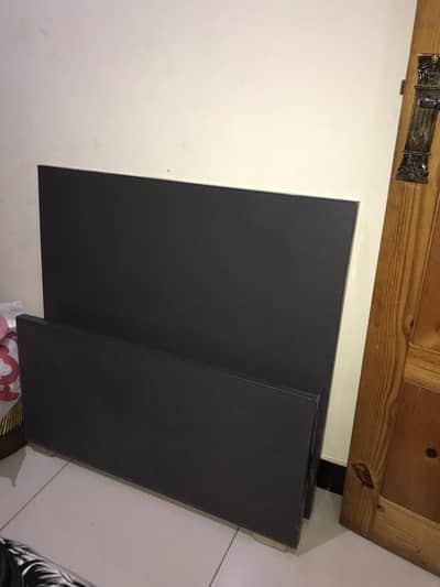 single bed with cupboard