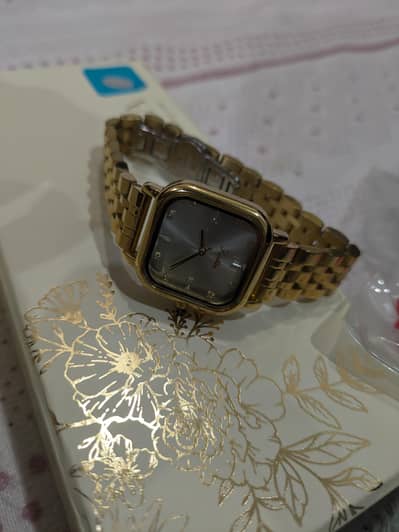 Ciara gold small dial women's watch.
