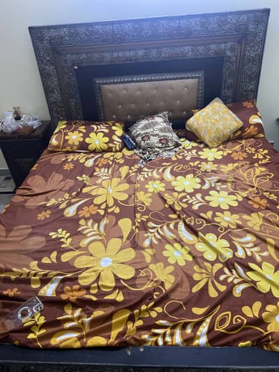 Second hand bed with side tables