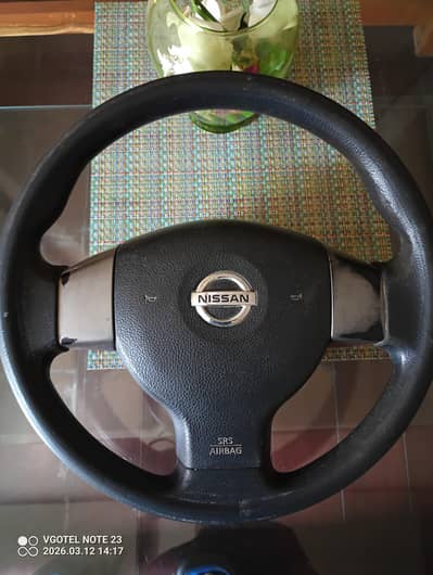 Nissan tida genuine steering