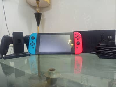 NINTENDO SWITCH (WITH ACCESSORIES AND FC 24) URGENT SALE