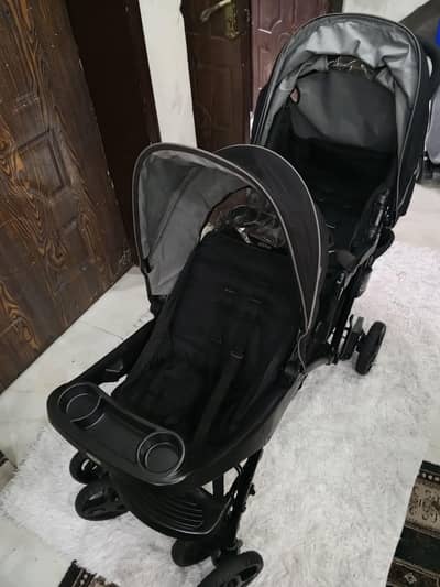 Almost new graco twin stroller