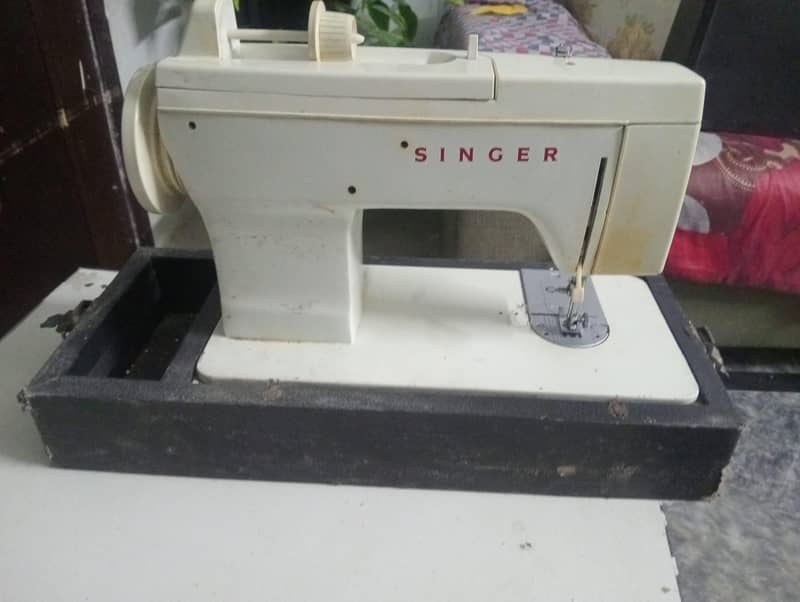 singer machine 0