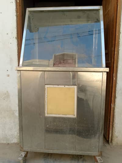 Counter and wooden cabinets