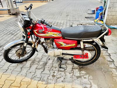 Honda 125 Red with genuine Copy Letter