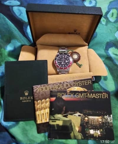 Rolex GMT-Master II 16710 “Coke” – 1999 – Swiss Only Dial Complete Box