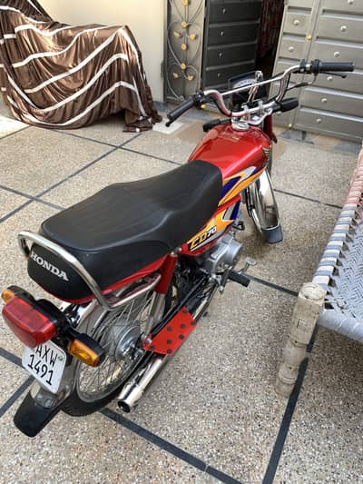 Total geniune bike no any fault just buy and drive red colour cd70