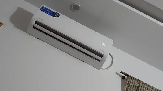 midea extreme 1.5 ton new condition