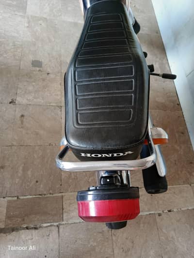 Honda 125 black bio metric on the spot